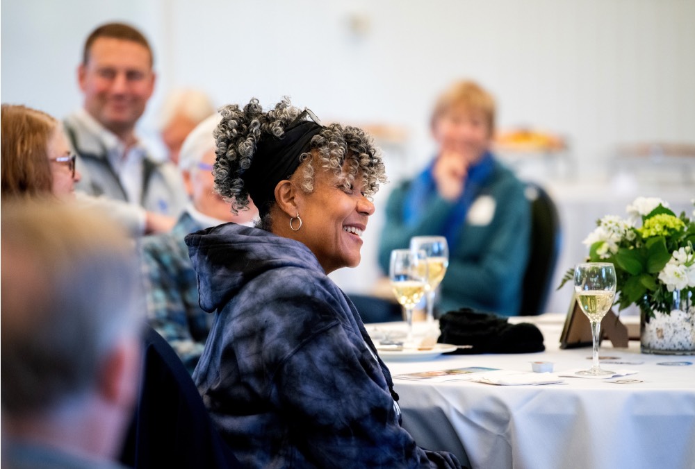 Women smiling from the side